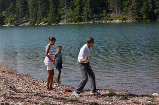 On a weekend trip to Acadia National Park in Maine, President Barack Obama showed his daughters, Malia and Sasha, how to skip stones during a hike in the park on July 17, 2010.Official White House Photo by Pete Souza